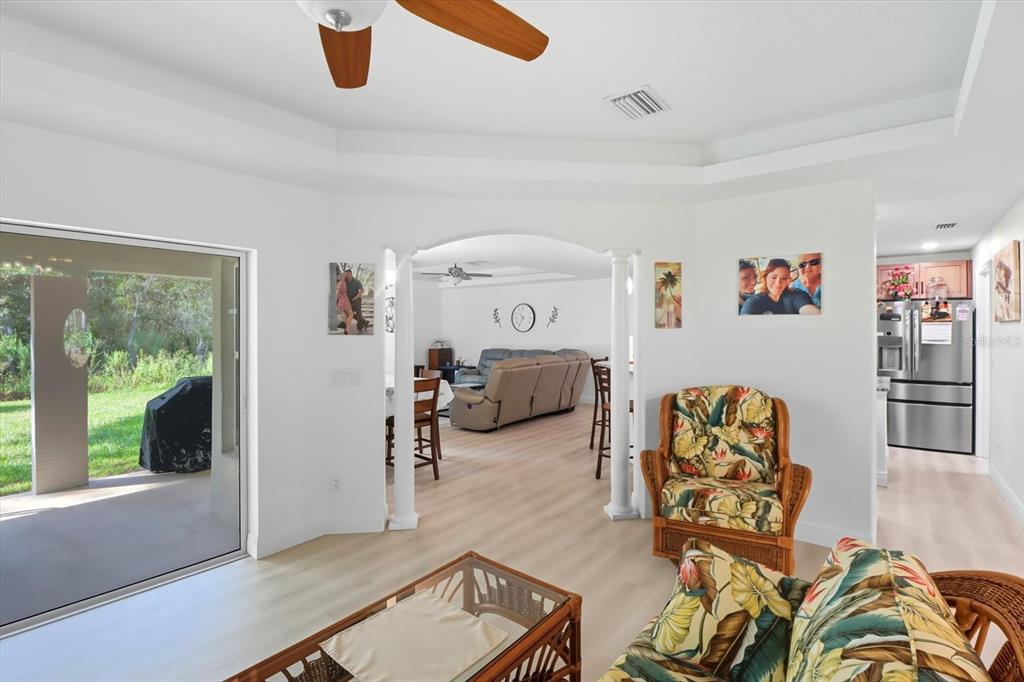 5032 North Crossgate Point Beverly Hills, FL 34465 - Photo 12 of 43 a bedroom with furniture and a large window