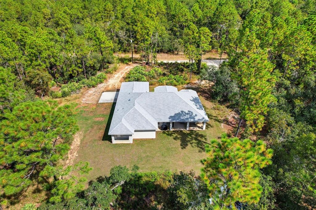 5032 North Crossgate Point Beverly Hills, FL 34465 - Photo 2 of 43 a view of a house with pool