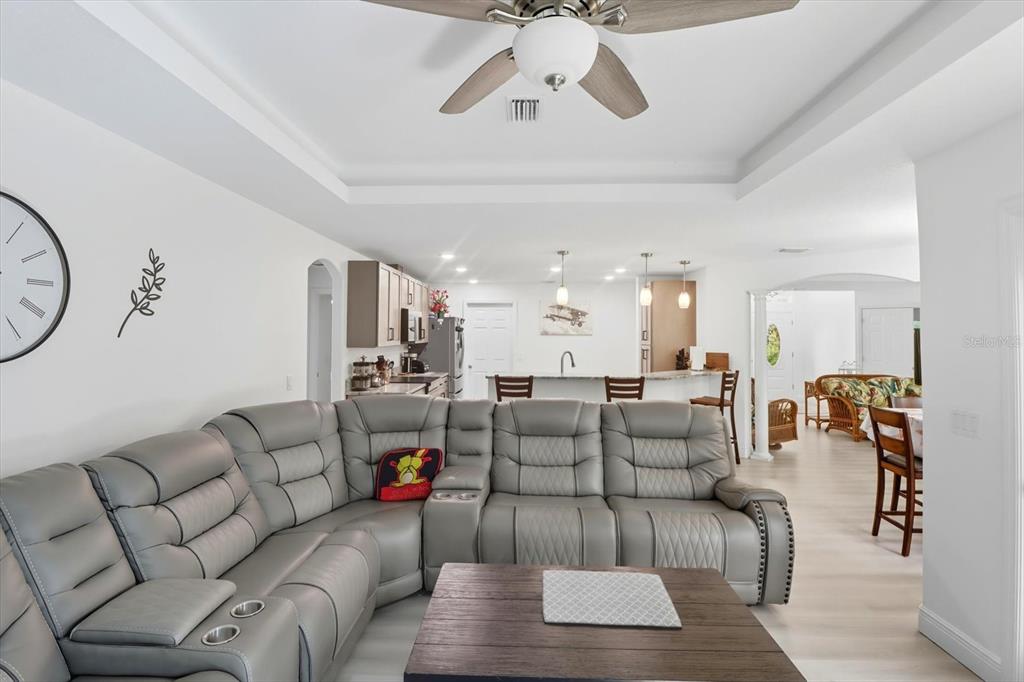 5032 North Crossgate Point Beverly Hills, FL 34465 - Photo 21 of 43 a living room with furniture or couch and a chandelier