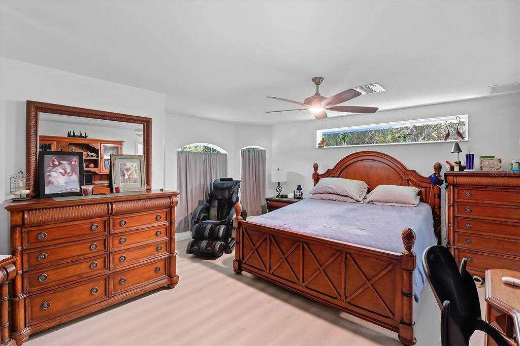 5032 North Crossgate Point Beverly Hills, FL 34465 - Photo 23 of 43 a bedroom with bed and a dresser