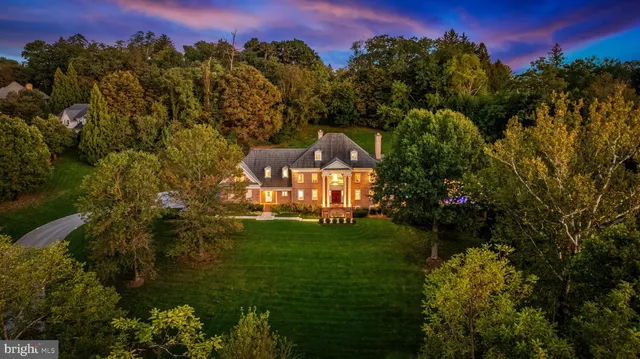 a view of swimming pool with outdoor seating and yard