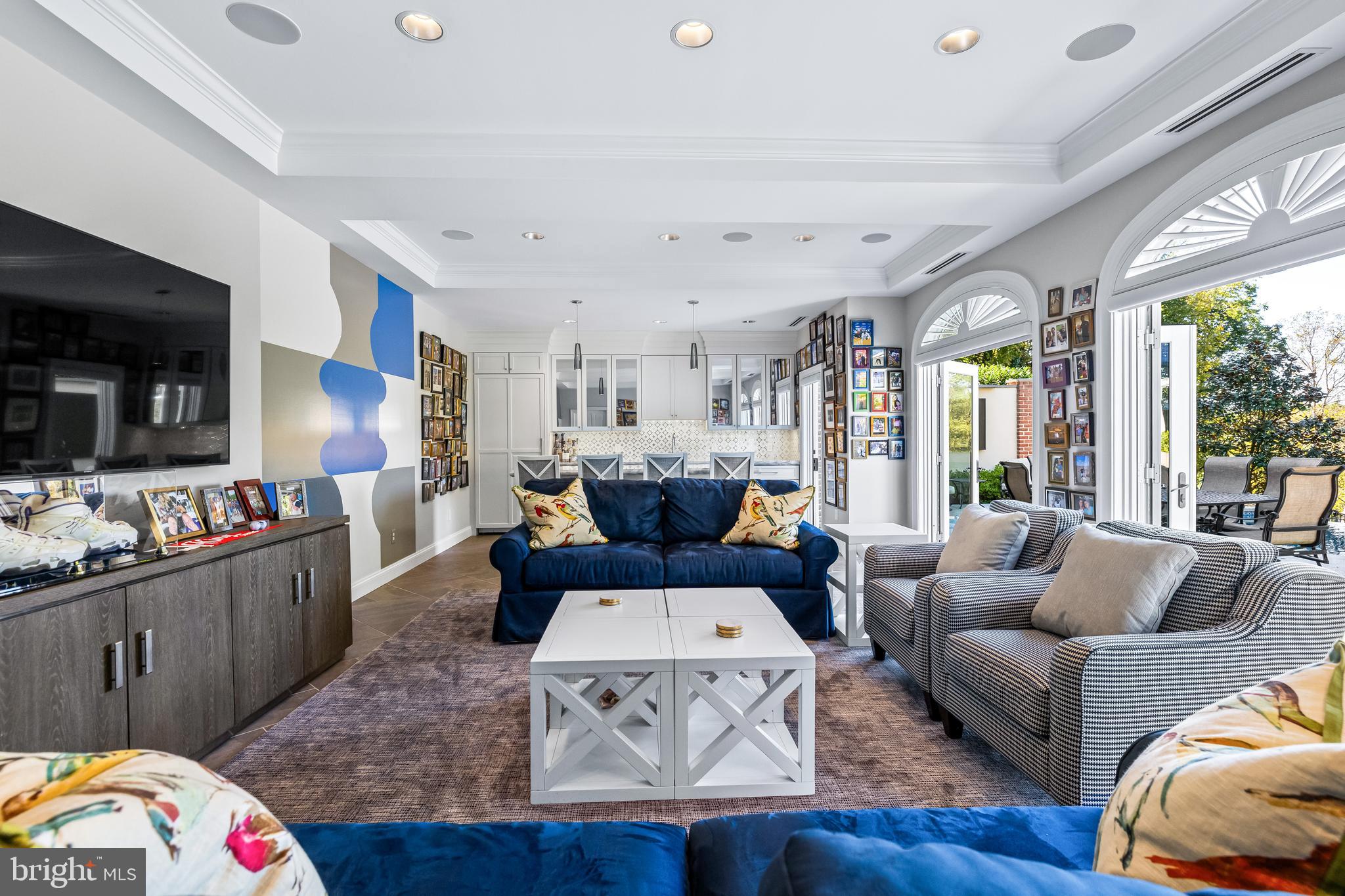 1421 Wine Spring Lane Baltimore, MD 21204 - Photo 121 of 150 a living room with furniture and a flat screen tv