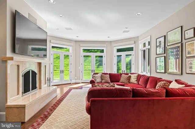 a spacious bathroom with a granite countertop tub shower and sink