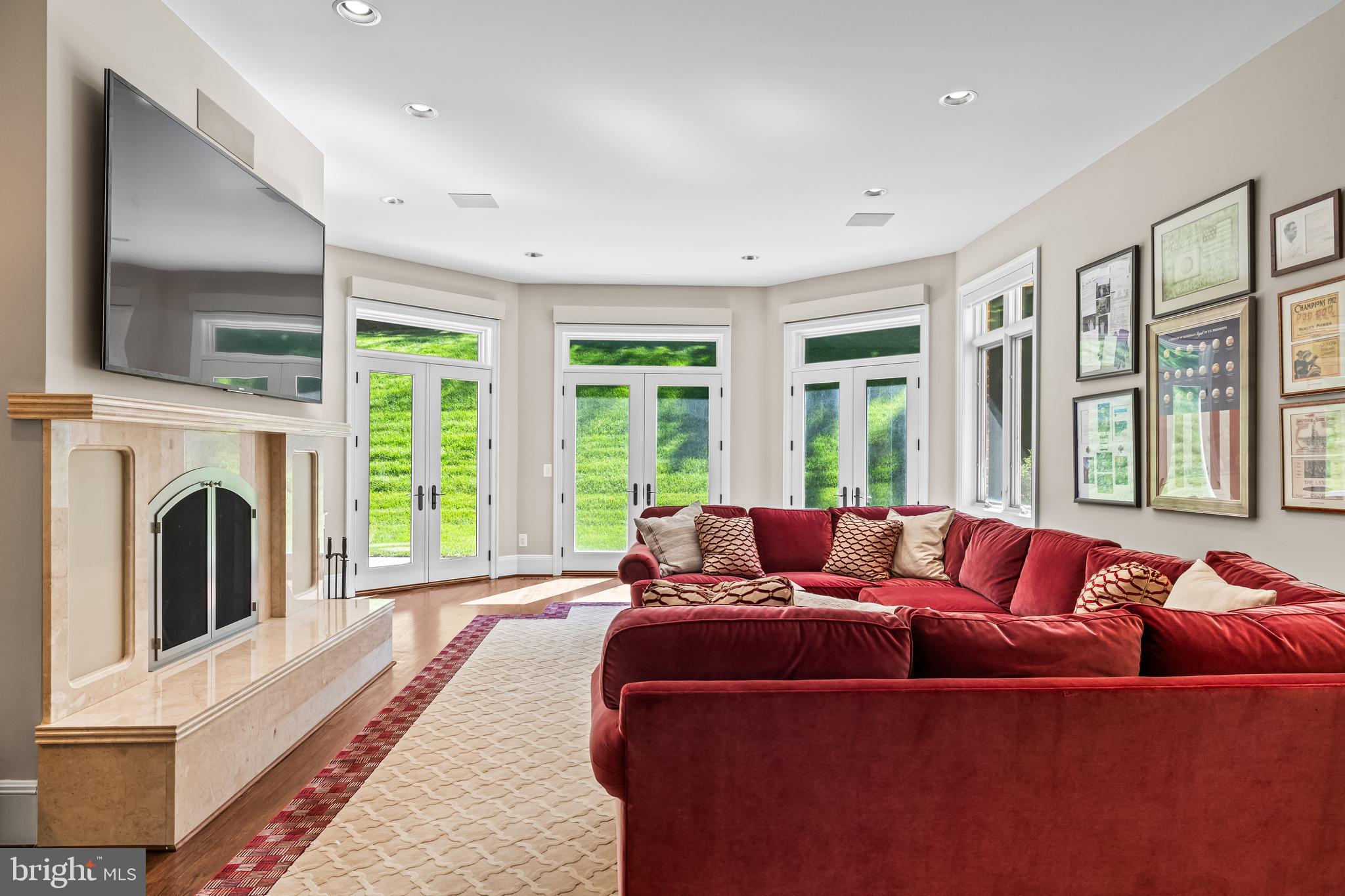 1421 Wine Spring Lane Baltimore, MD 21204 - Photo 31 of 150 a living room with furniture and a flat screen tv
