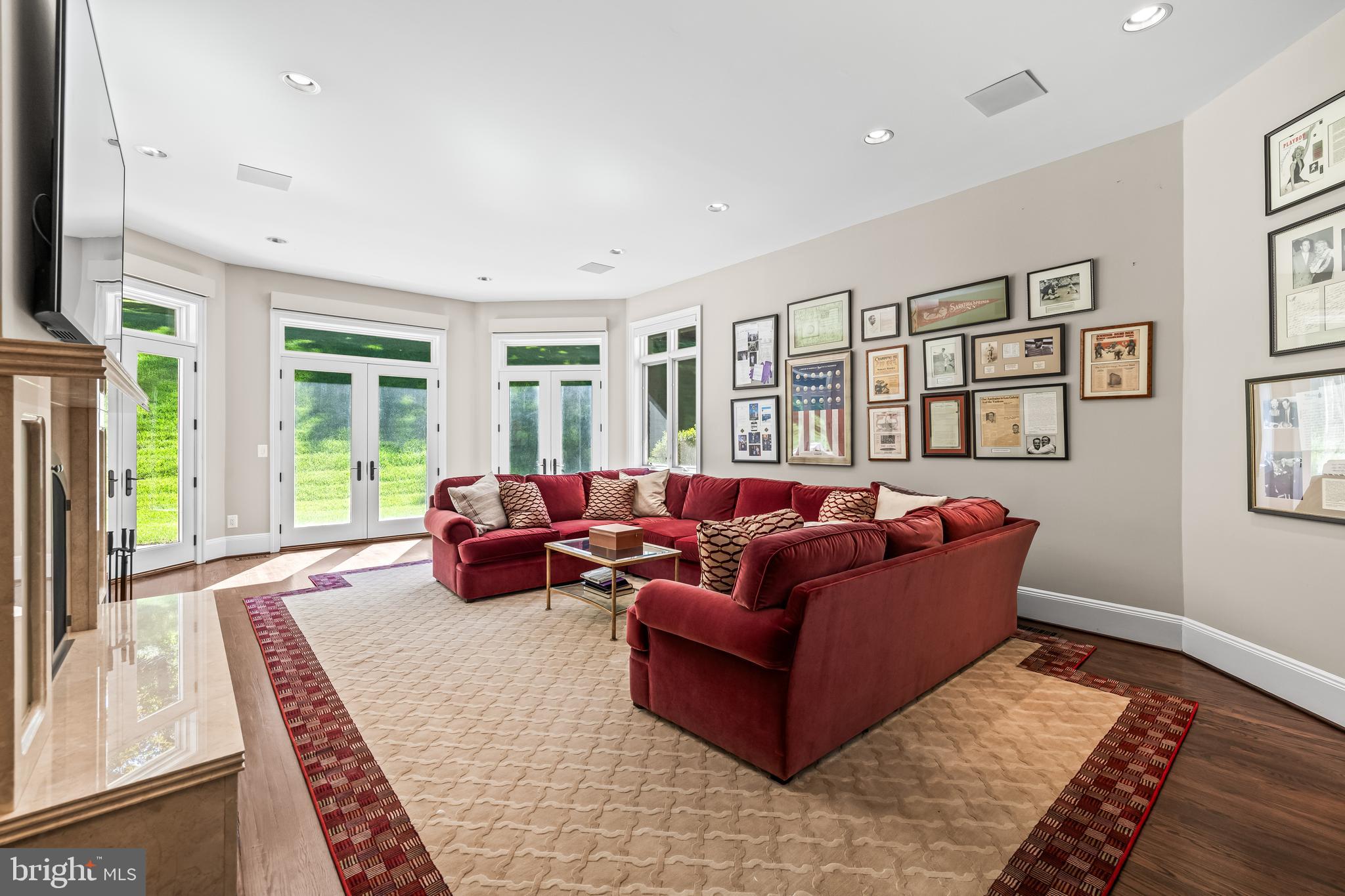 1421 Wine Spring Lane Baltimore, MD 21204 - Photo 32 of 150 a living room with furniture fireplace and a large window