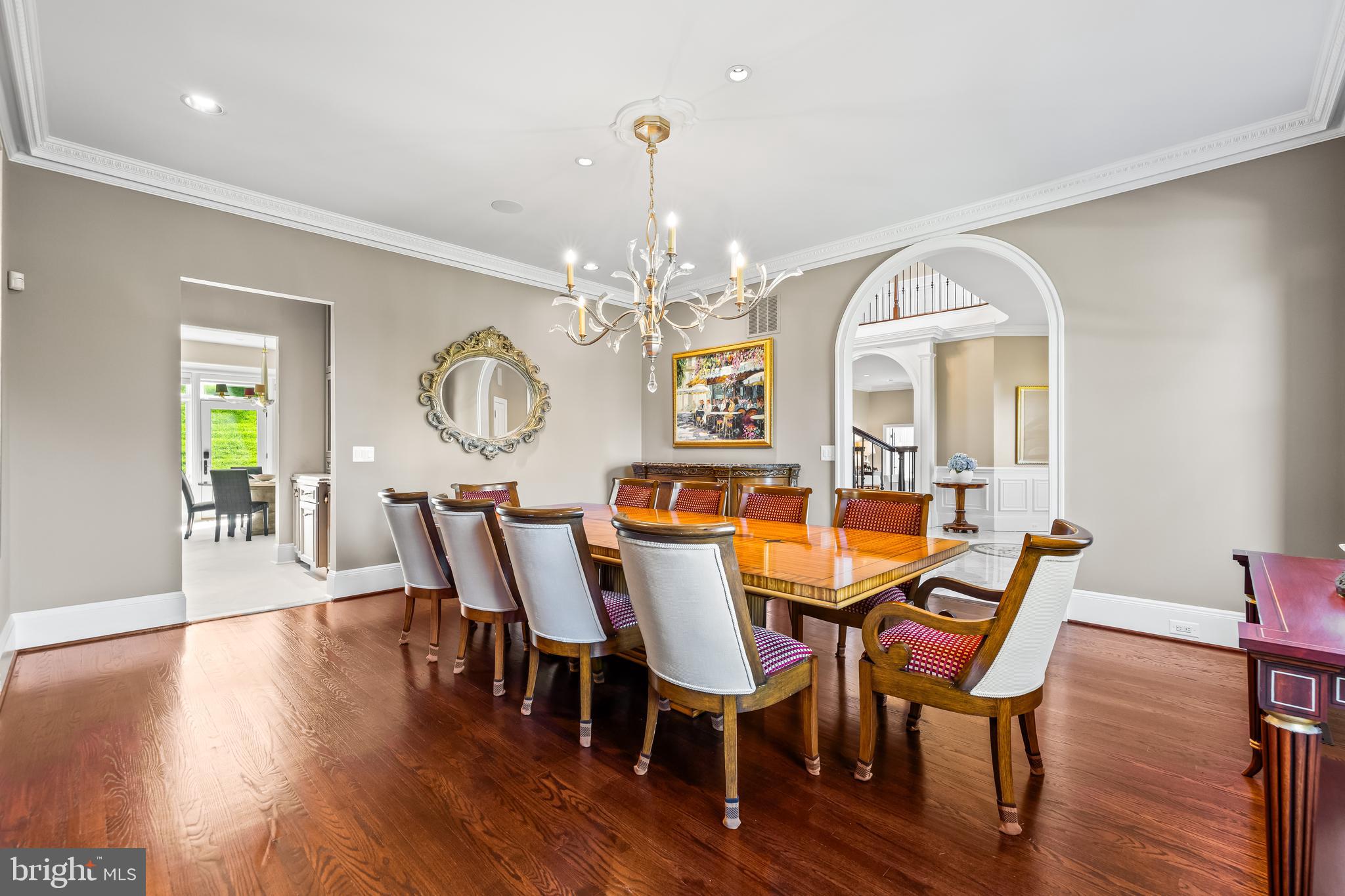 1421 Wine Spring Lane Baltimore, MD 21204 - Photo 36 of 150 a view of a dining room with furniture a chandelier and wooden floor