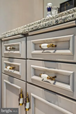 a bathroom with a shower a sink and a mirror