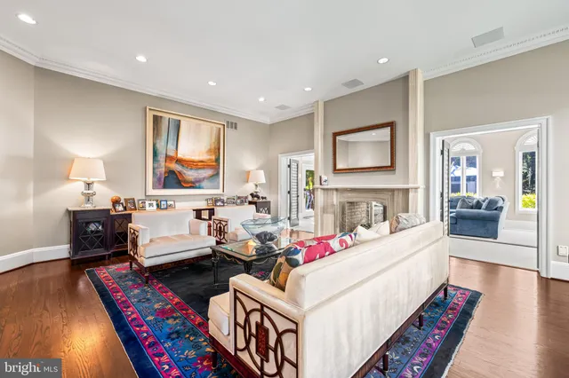 a aerial view of a house with a yard basket ball court and outdoor seating