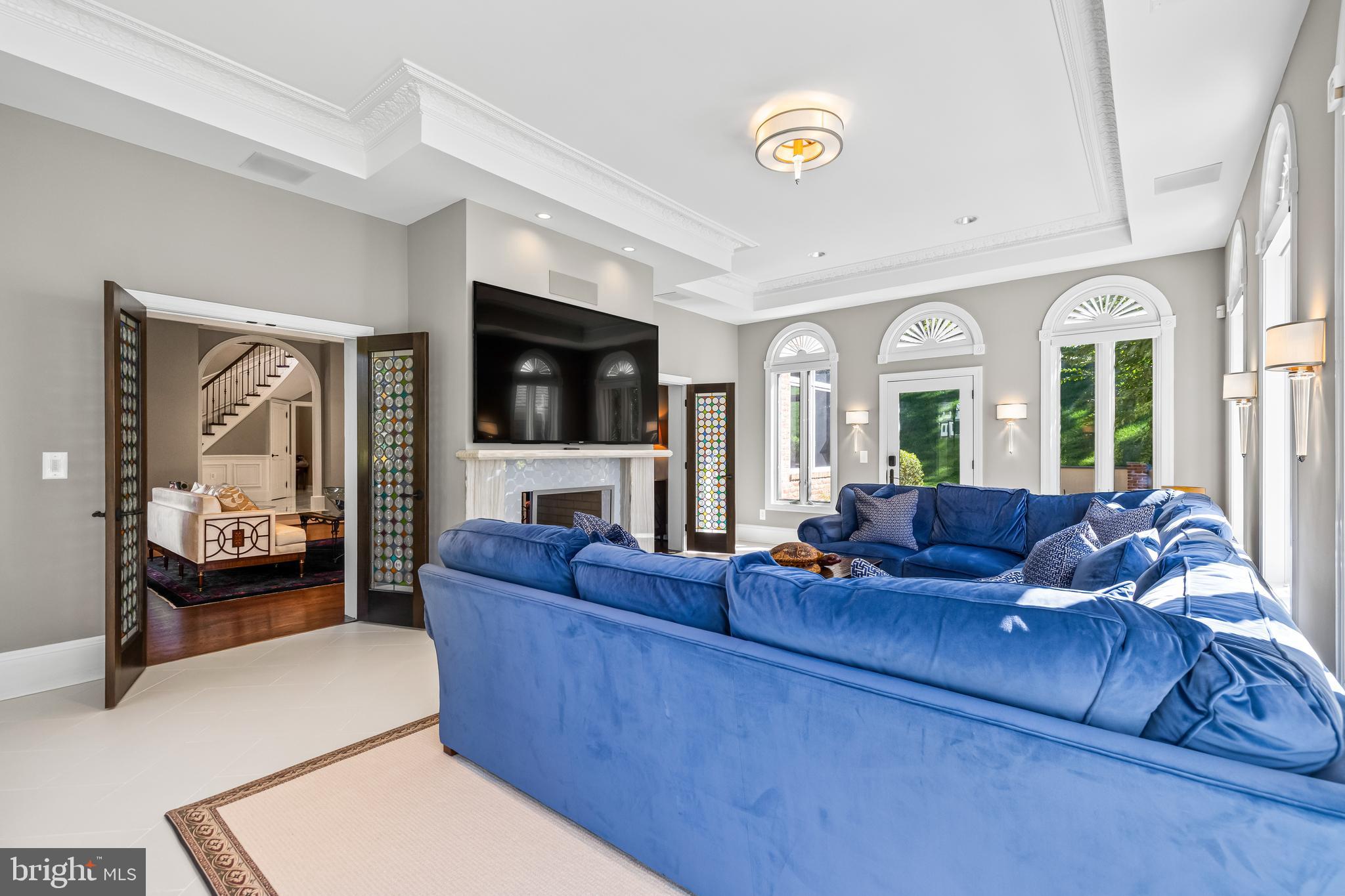 1421 Wine Spring Lane Baltimore, MD 21204 - Photo 53 of 150 a living room with furniture and a flat screen tv