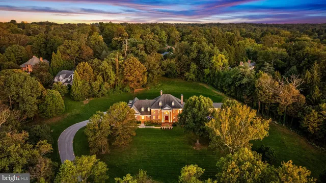 a view of entryway and hall with dining room