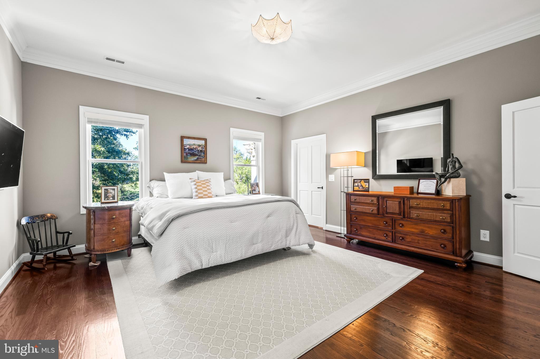 1421 Wine Spring Lane Baltimore, MD 21204 - Photo 96 of 150 a bedroom with a bed and wooden floor