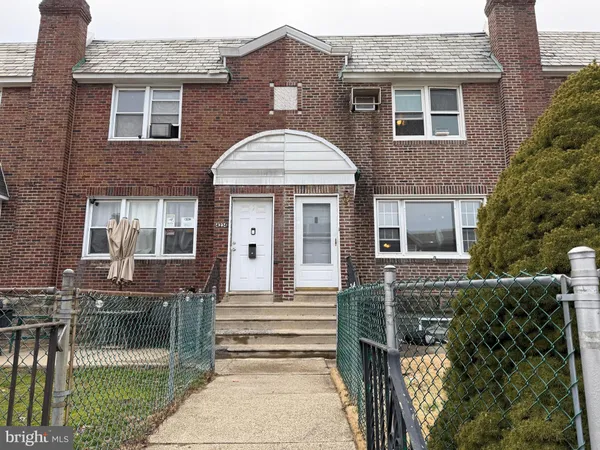 a front view of a house with a porch