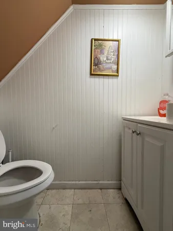 a bathroom with a toilet