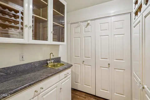 a view of a flower room with wooden door