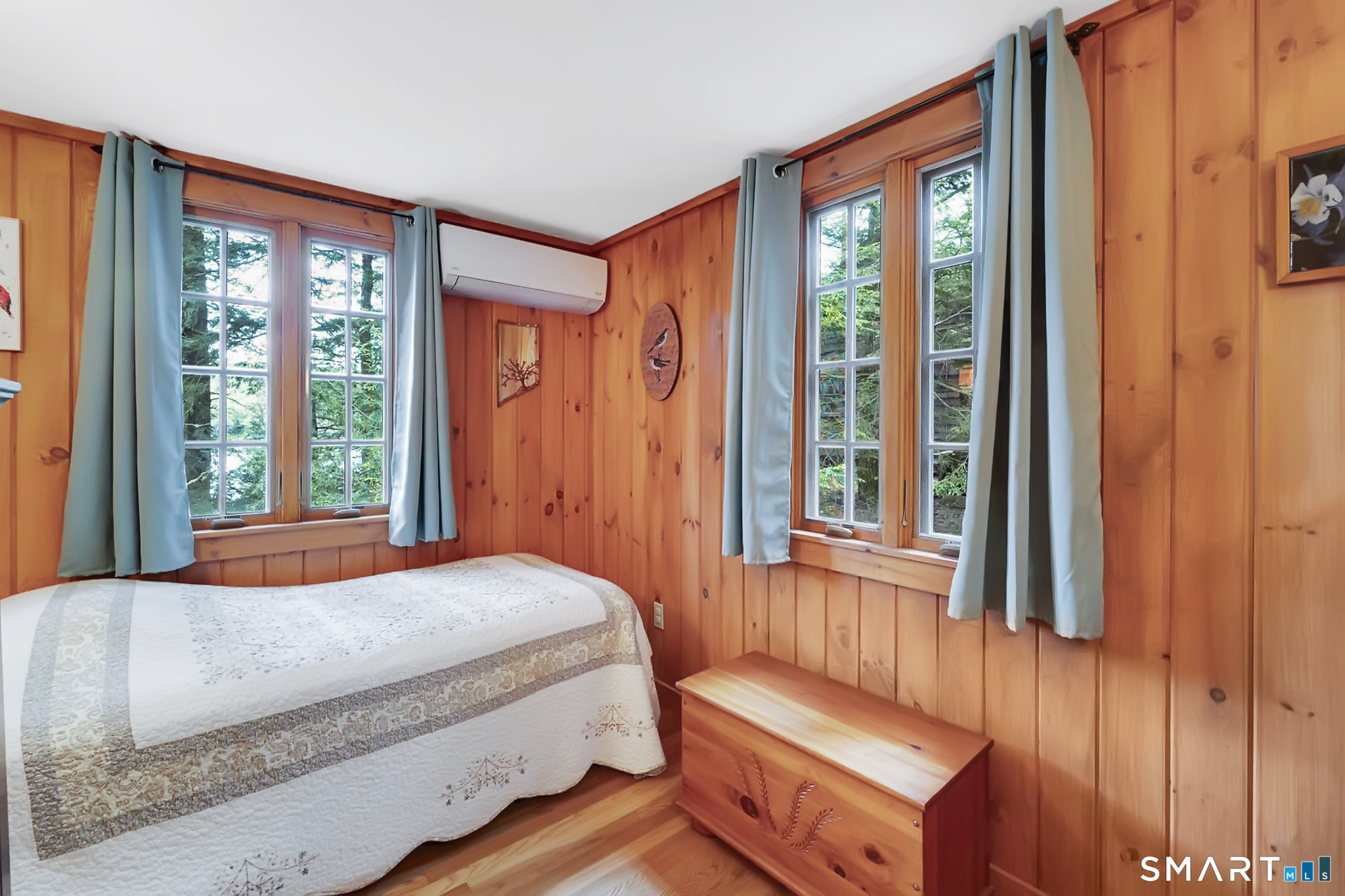 47 Pinehurst Road Hartland, CT 06091 - Photo 21 of 39 a bedroom with a bed and wooden floor
