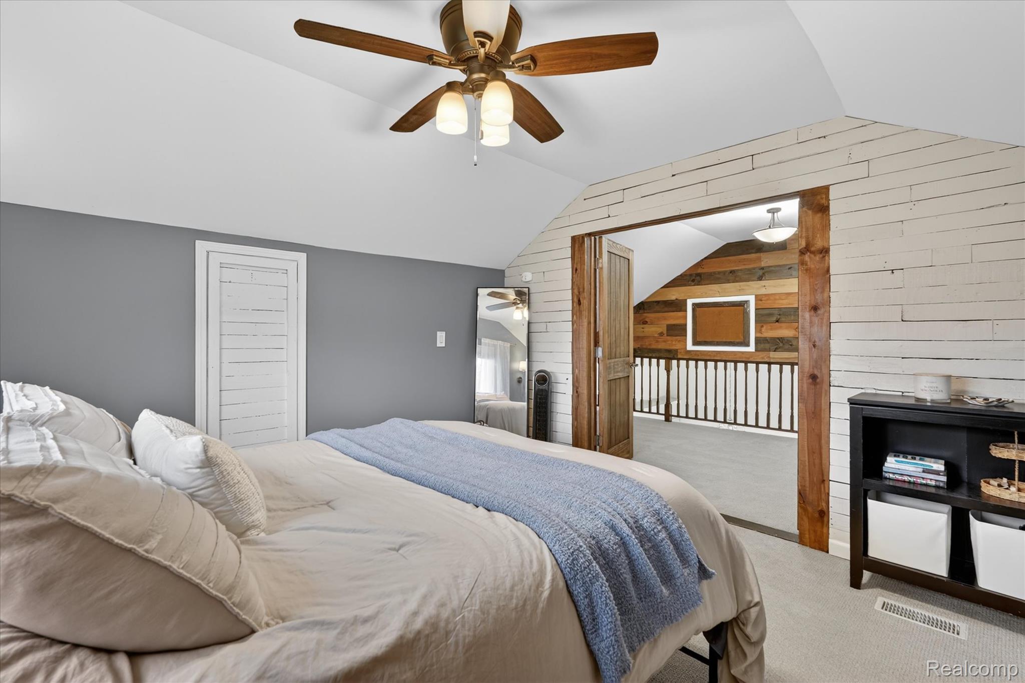13508 North Center Road Clio, MI 48420 - Photo 21 of 38 Bedroom with wooden walls, carpet flooring, and ceiling fan