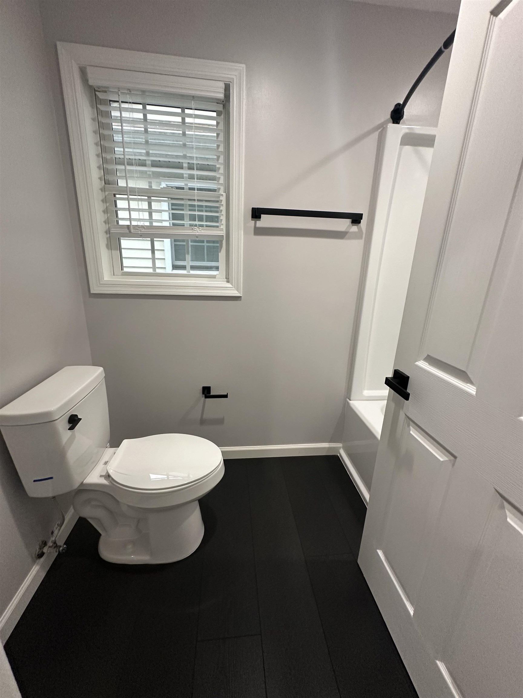 24 New Street, Unit 2 Bayonne, NJ 07002 - Photo 13 of 21 a bathroom with a sink and a toilet