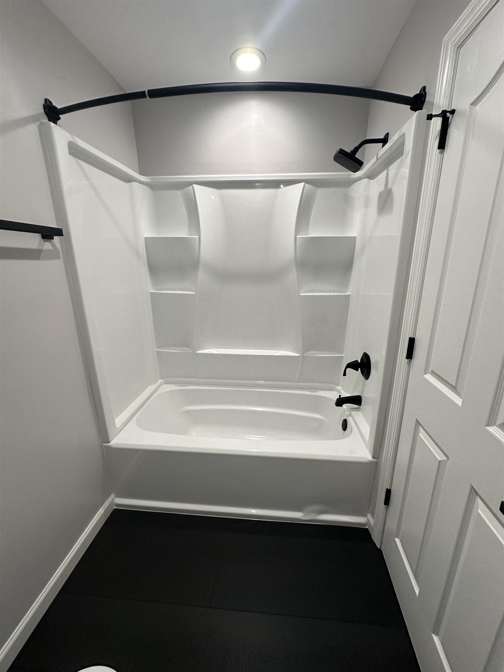24 New Street, Unit 2 Bayonne, NJ 07002 - Photo 14 of 21 a bathroom with a bathtub and a shower