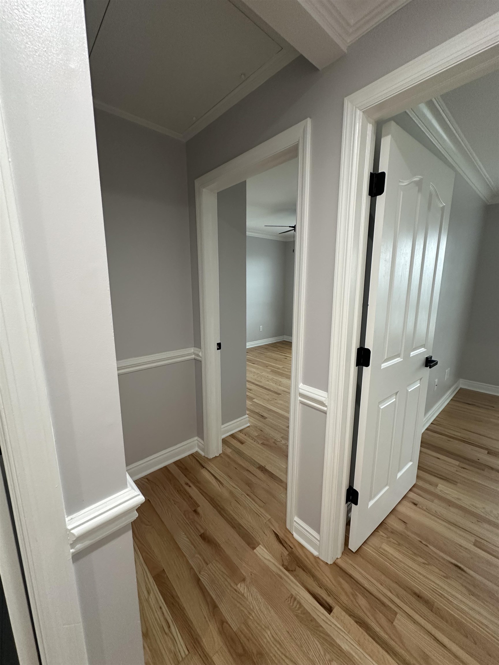 24 New Street, Unit 2 Bayonne, NJ 07002 - Photo 15 of 21 a view of a hallway with wooden floor and staircase