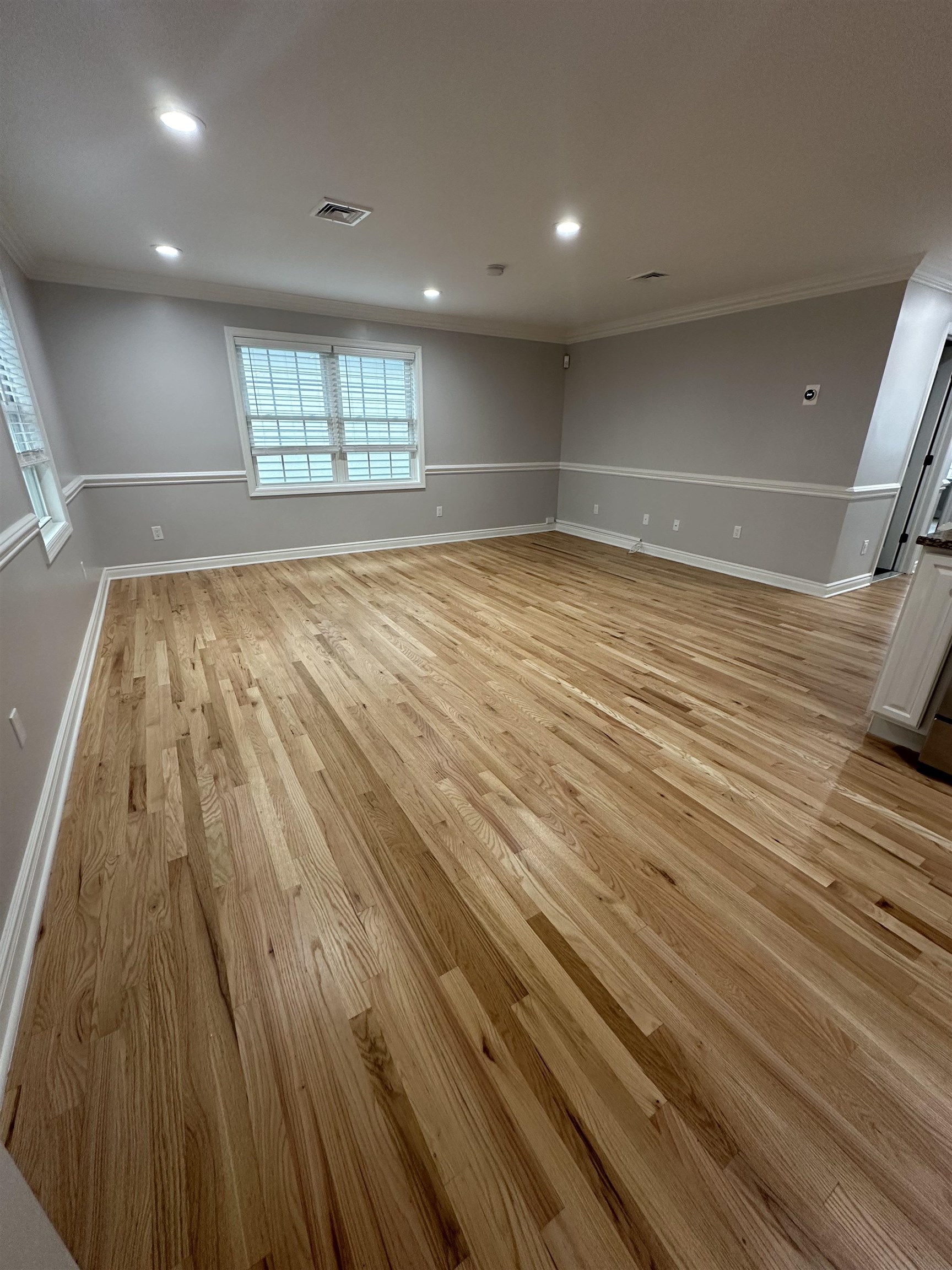 24 New Street, Unit 2 Bayonne, NJ 07002 - Photo 6 of 21 a view of an empty room and window