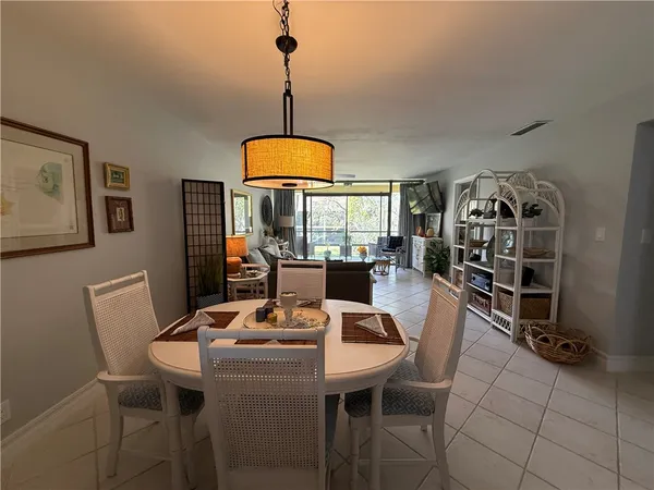 a bathroom with a sink toilet tub and shower