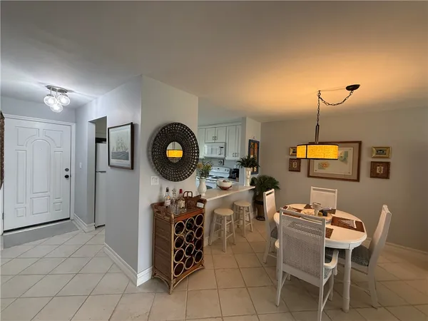 a kitchen with a sink and a stove