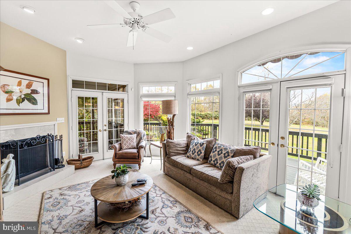 2634 Point Of Rocks Road Jefferson, MD 21755 - Photo 25 of 86 Great room with french doors to back deck & porch