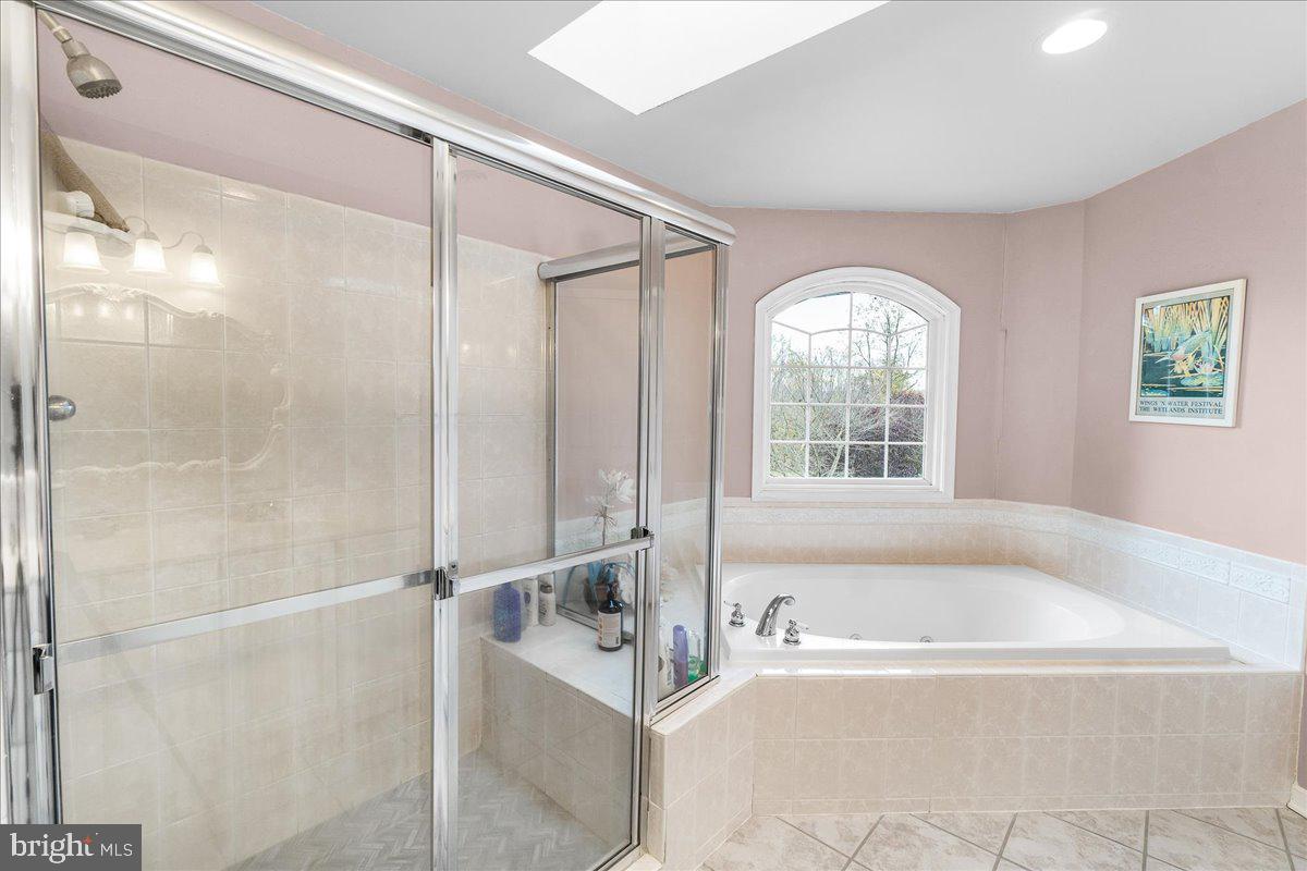 2634 Point Of Rocks Road Jefferson, MD 21755 - Photo 48 of 86 Primary bathroom, tub and shower