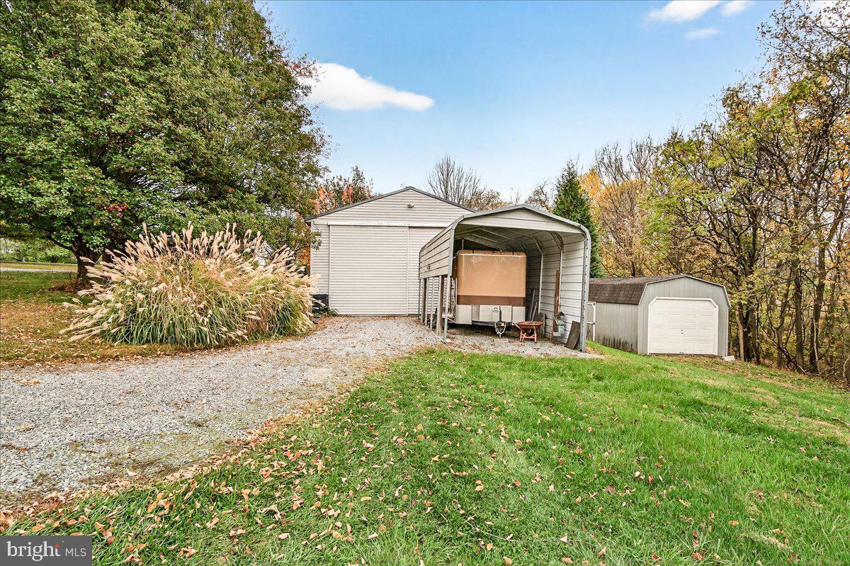2634 Point Of Rocks Road Jefferson, MD 21755 - Photo 62 of 86 Pole barn, car cover, single car garage