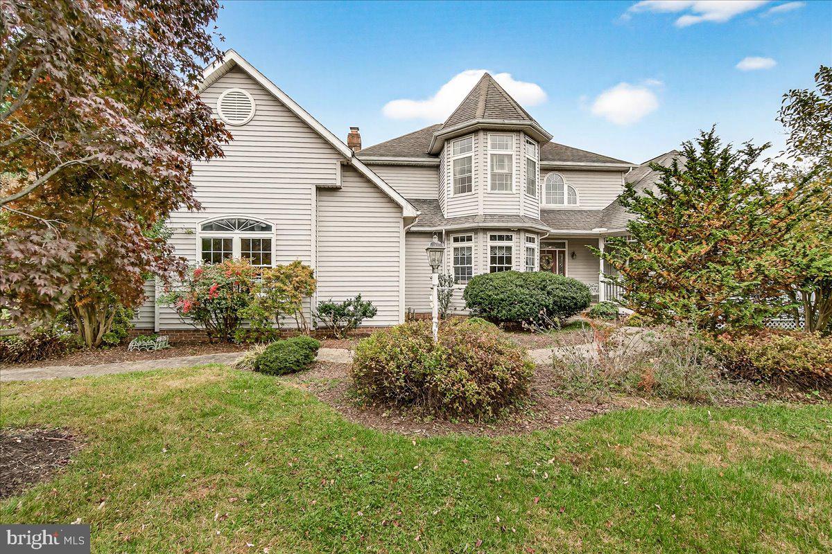 2634 Point Of Rocks Road Jefferson, MD 21755 - Photo 66 of 86 Front yard with evergreen bushes
