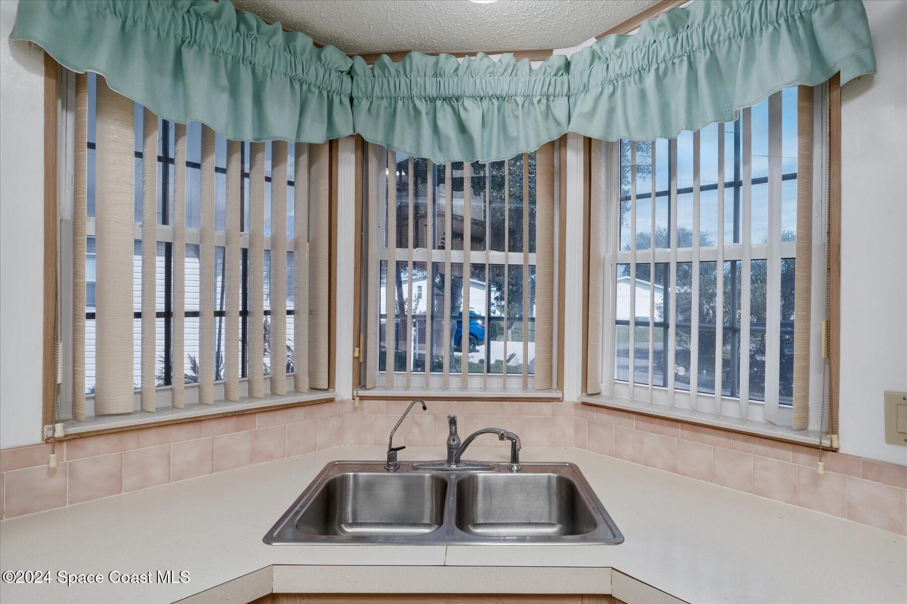 7674 Fox Hunter Circle, Unit L24 Micco, FL 32976 - Photo 6 of 33 08-DSC01623