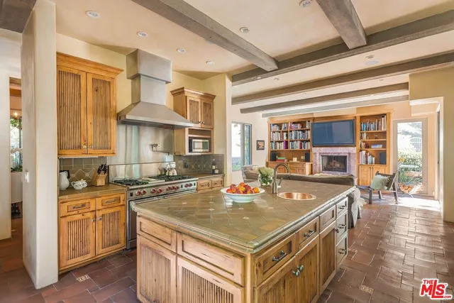 a view of a dining room with furniture wooden floor and chandelier