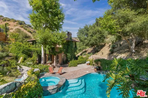 a view of a backyard with a small park