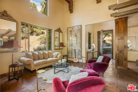 a room with furniture and window