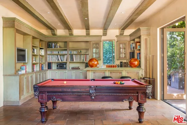 a view of a dining room with furniture wooden floor and chandelier