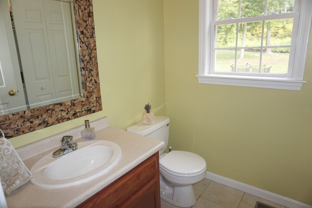 84 Fairview Park Road Sturbridge, MA 01566 - Photo 12 of 30 a bathroom with a sink and a toilet