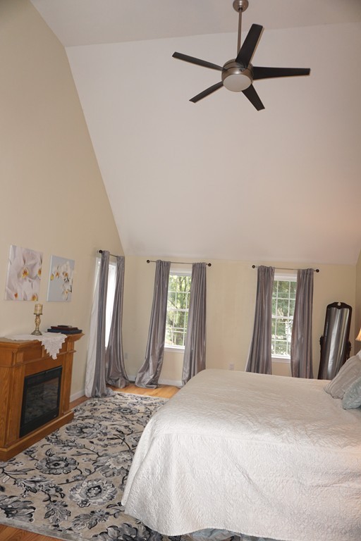 84 Fairview Park Road Sturbridge, MA 01566 - Photo 15 of 30 a bedroom with a bed and a dresser