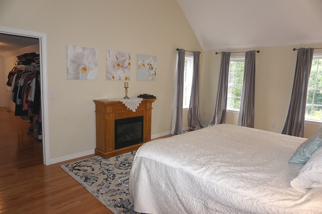 84 Fairview Park Road Sturbridge, MA 01566 - Photo 17 of 30 a bedroom with a bed and a dresser