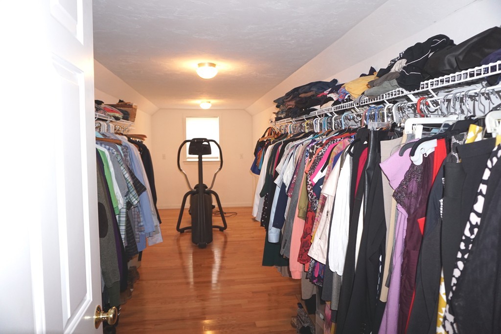 84 Fairview Park Road Sturbridge, MA 01566 - Photo 18 of 30 a view of walk in closet with clothes and shoes