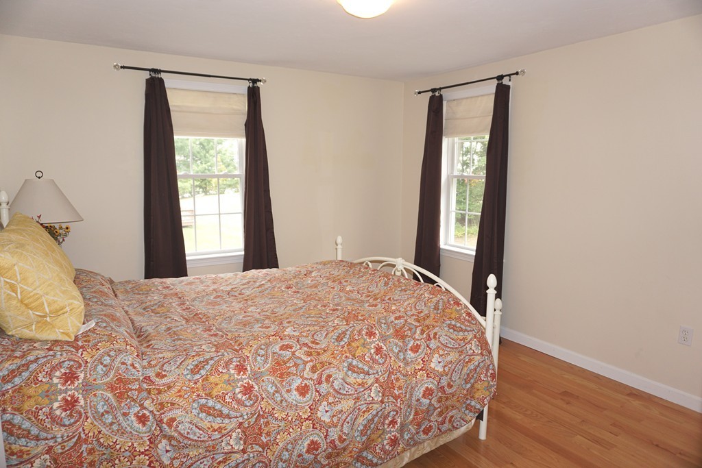 84 Fairview Park Road Sturbridge, MA 01566 - Photo 24 of 30 a bedroom with a bed and a window