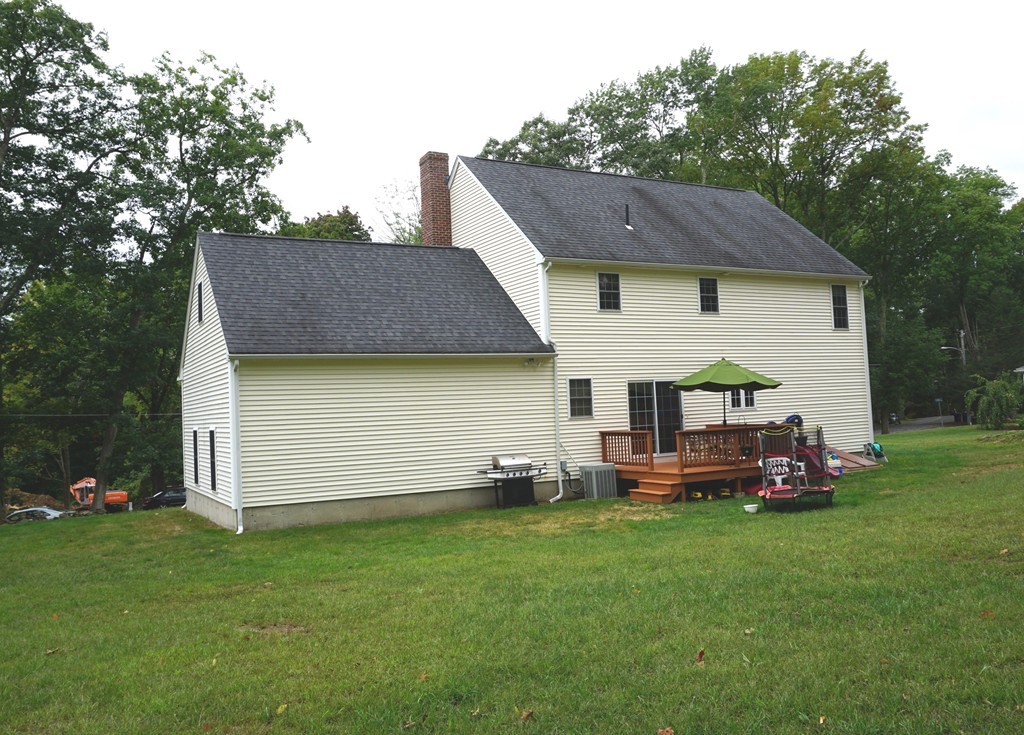 84 Fairview Park Road Sturbridge, MA 01566 - Photo 29 of 30 a front view of a house with a garden and plants