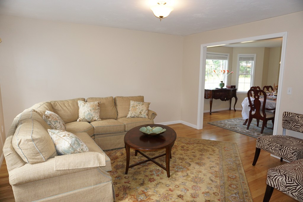 84 Fairview Park Road Sturbridge, MA 01566 - Photo 6 of 30 a living room with furniture a rug and a window