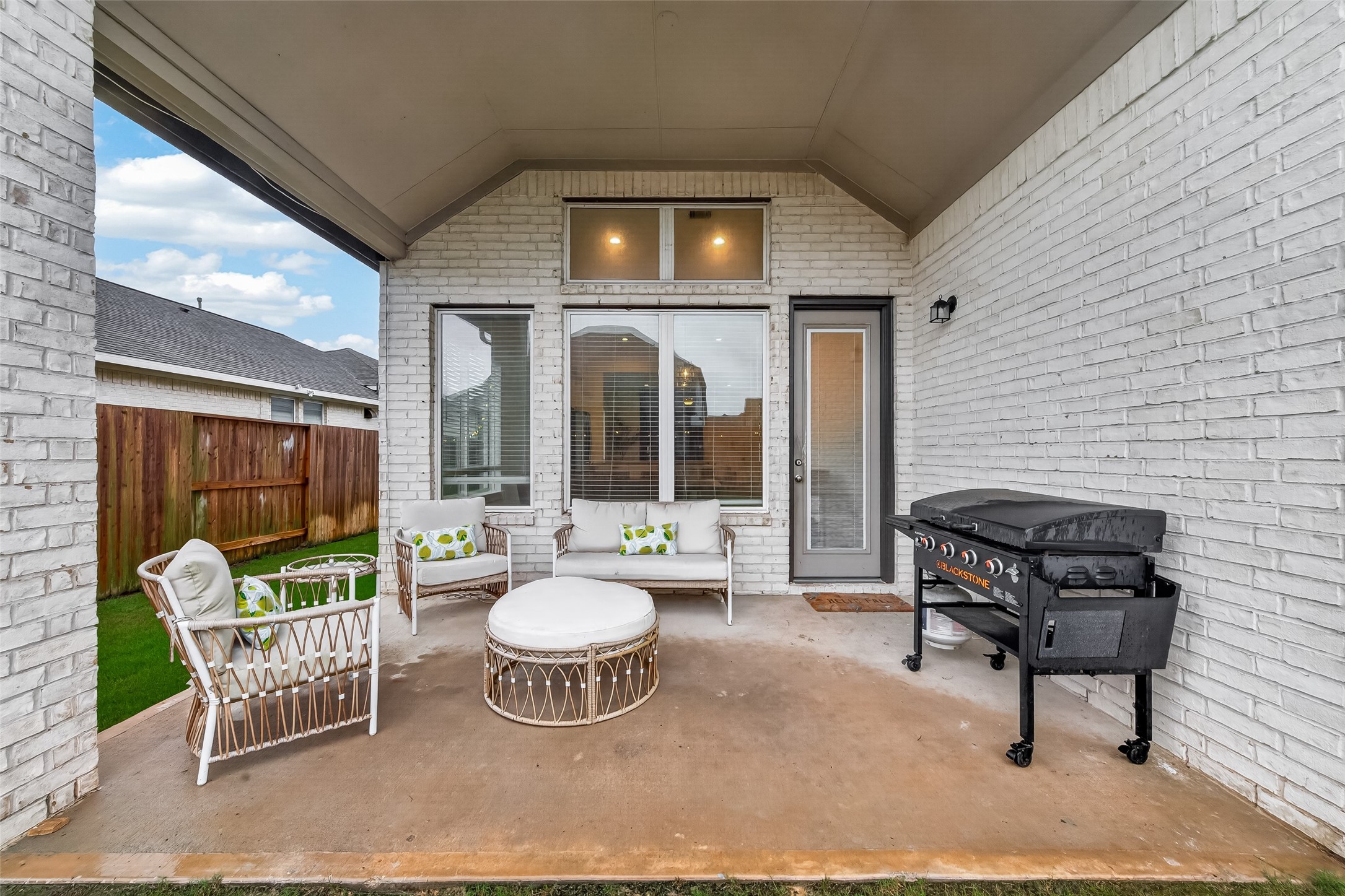 5019 Country Mdws Trail Rosharon, TX 77583 - Photo 39 of 49 a outdoor living space with furniture and a garden
