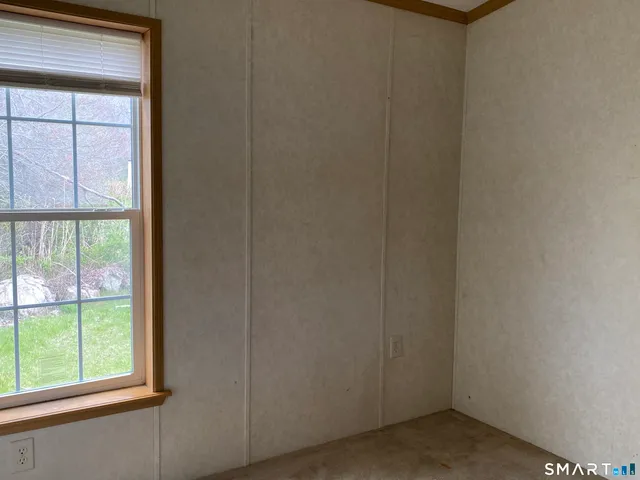 a view of a small space with a window