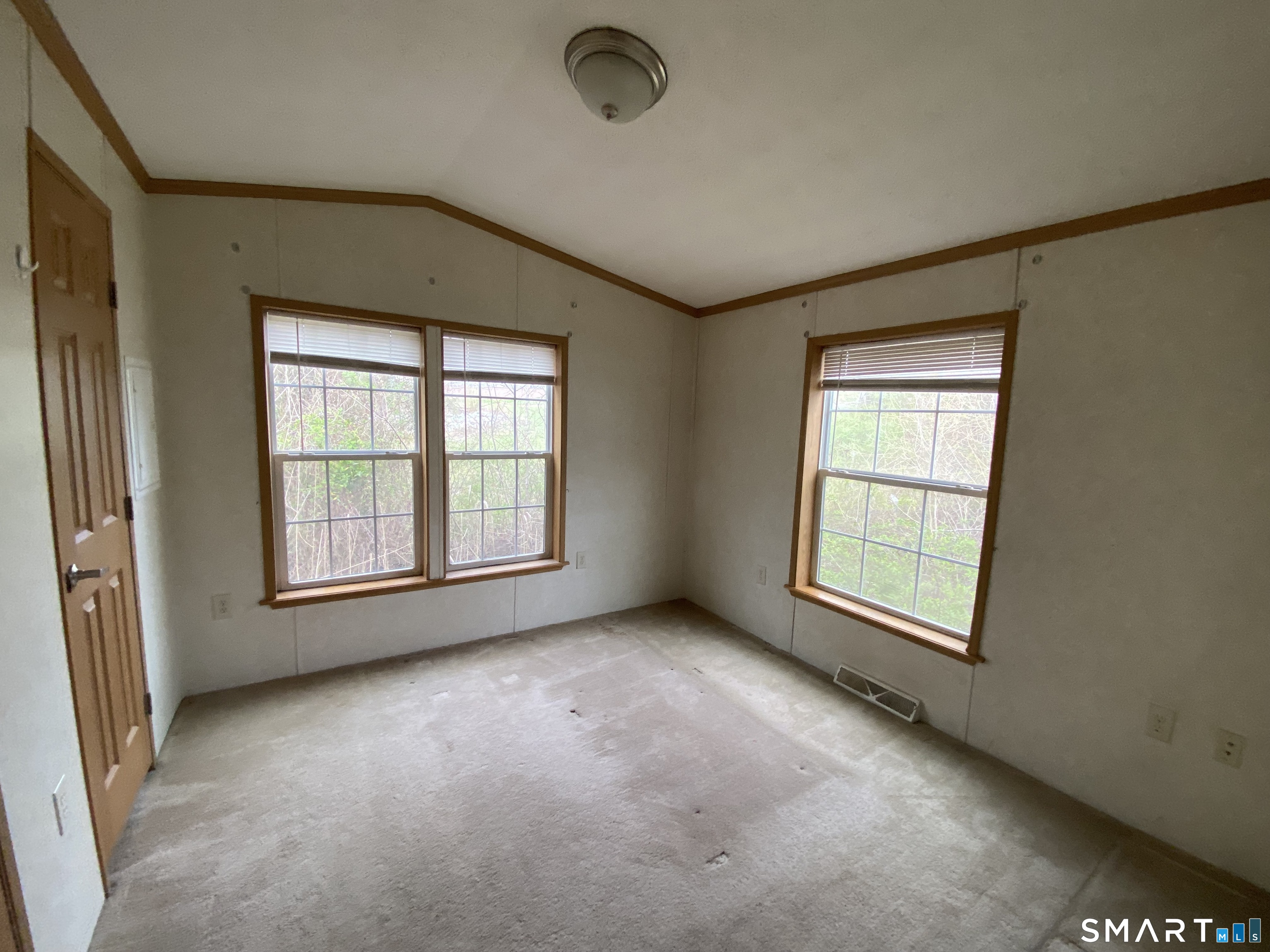 34 Terrace Drive Waterford, CT 06385 - Photo 6 of 8 an empty room with windows