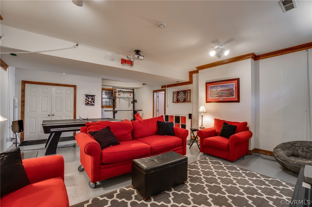 14300 West Salisbury Road Midlothian, VA 23113 - Photo 17 of 50 a living room with furniture a red couch and a window
