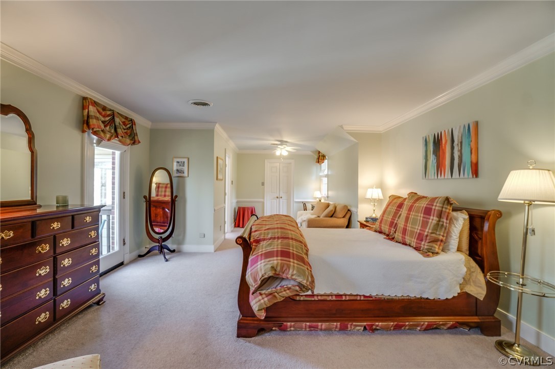 14300 West Salisbury Road Midlothian, VA 23113 - Photo 27 of 50 a spacious bedroom with a bed a mirror and dresser