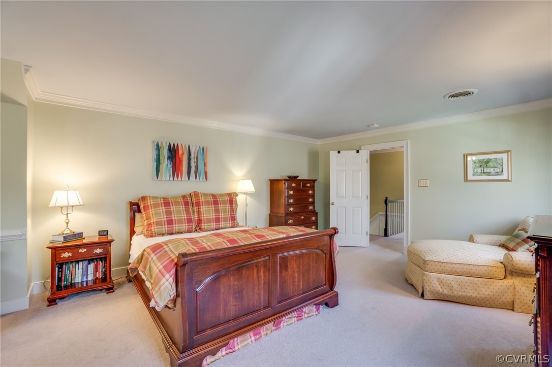 14300 West Salisbury Road Midlothian, VA 23113 - Photo 28 of 50 a bedroom with a bed and a couch