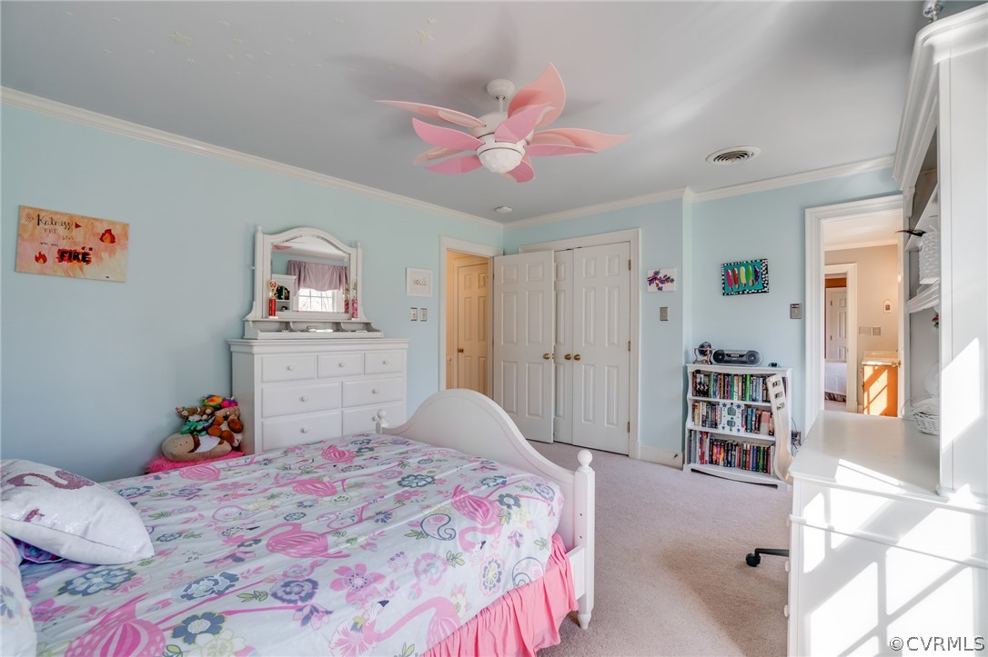 14300 West Salisbury Road Midlothian, VA 23113 - Photo 35 of 50 a bedroom with a bed and a cabinets
