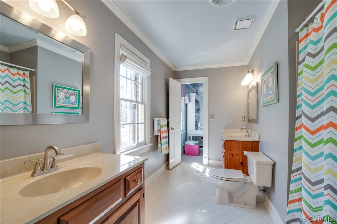 14300 West Salisbury Road Midlothian, VA 23113 - Photo 39 of 50 a spacious bathroom with a sink a toilet and a tub